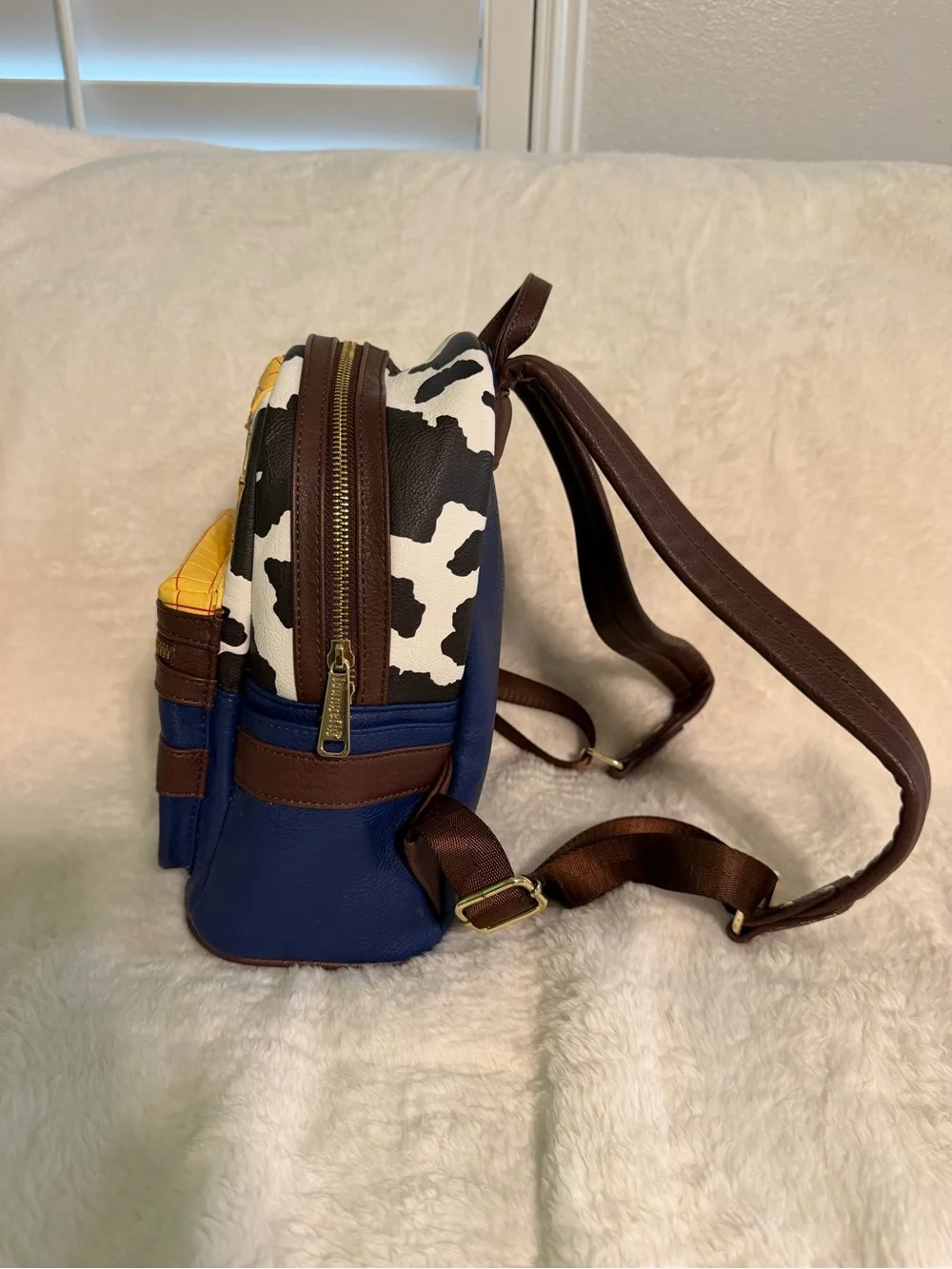 Loungefly Woody-Inspired Mini Backpack in Blue, Brown, Yellow